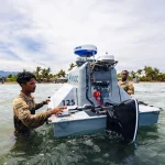 U.S. Army military personnel, assigned to the 125th Intelligence and Electronic Warfare Battalion, recover an unmanned surface vessel during Exercise Salaknib 2026 at Casiguran, Philippines, June 9, 2026. (U.S. Army photo by Pfc. Peter Bannister)